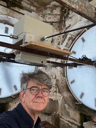 Andrew Markerink of Master Clockmakers inside the Corowa War Memorial Clock.