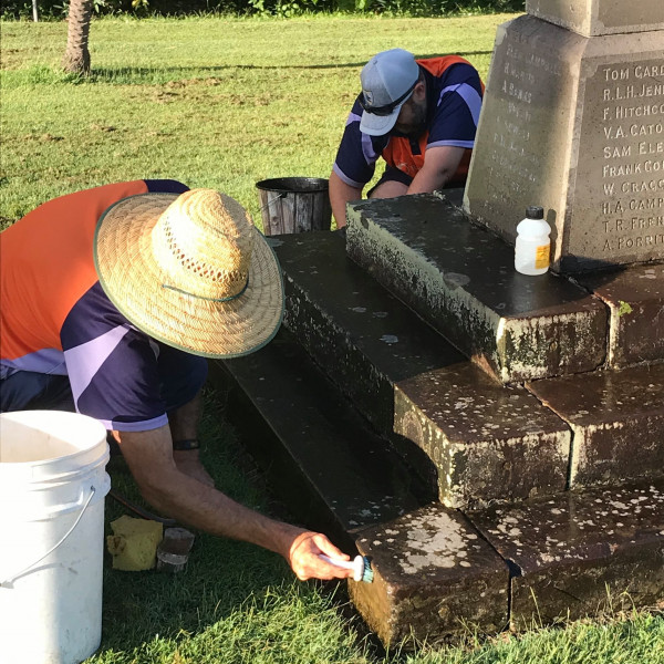 Cleaning work underway on the Celtic Cross War Memorial, Gosford.