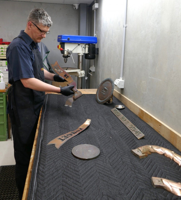 Restoration work underway on one of the Honour Rolls.